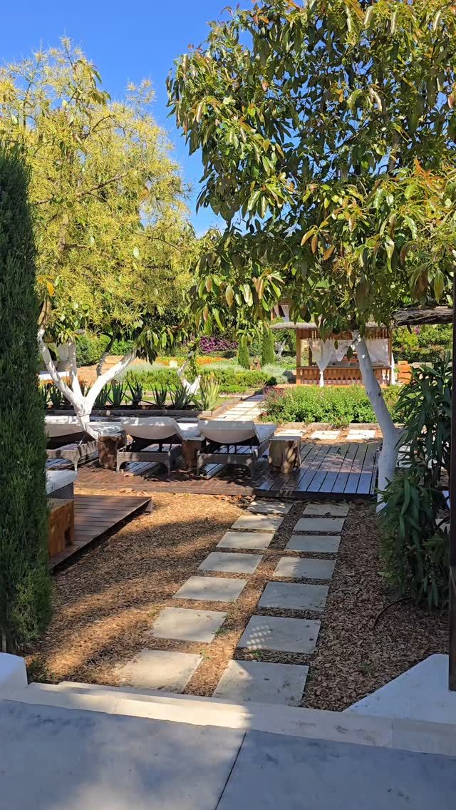 Every pathway leads to the ultimate Ibiza relaxation, in the spa garden at Atzaró Agroturismo Hotel

Unwind beneath swaying palms in the tranquil spa garden, where every breath feels like a gentle exhale of peace. Let the serenity of a spa day cradle you, heart and soul, in nature’s quiet embrace

Deluxe Spa Day Experience - 210€ pp
Spa, Yoga, Wellness, Massage, Lunch 

Spa Day Experience - 120€ pp
Spa, Yoga, Wellness, Lunch

Purifying Spa Day Experience - 215€ pp
Spa, Yoga, Wellness, Lymphatic Massage, Lunch 

Beauty Spa Day Experience - 220€ pp
Spa, Yoga, Wellness, Facial, Lunch

Spa Day Experience Reservations 
• +34 971 33 88 38
• spa@atzaro.com
• atzaro.com/spa-ibiza/day-experiences 
• 'spa day experiences' option in bio link 

#atzarohotel #atzaroibiza #atzaro #atzarogroup

#atzarodayexperiences #atzarospa #atzarospagarden #wellness #naturalluxury #sustainablehotel #ibiza #ibiza2025